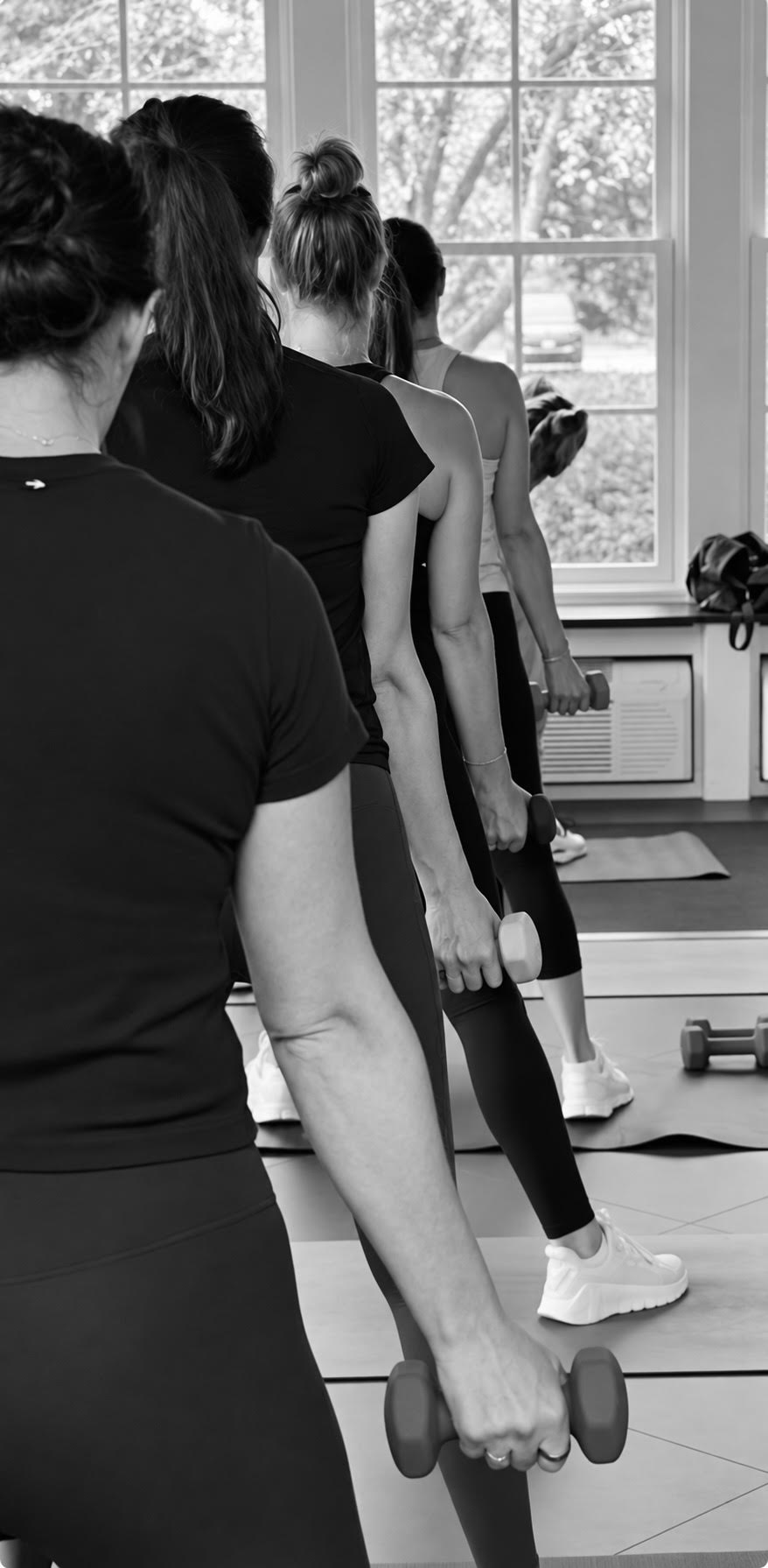 A RESET class training with light dumbbells